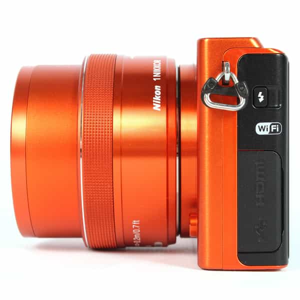 Nikon 1 J4 Mirrorless Digital Camera, Orange {18.4MP} with 10-30mm  f/3.5-5.6 VR PD-Zoom Lens, Orange {40.5} at KEH Camera