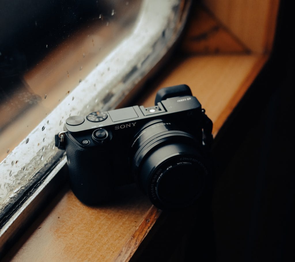 Sony a6400 - Expert Advice Sony a6400 mirrorless camera sitting on window sill