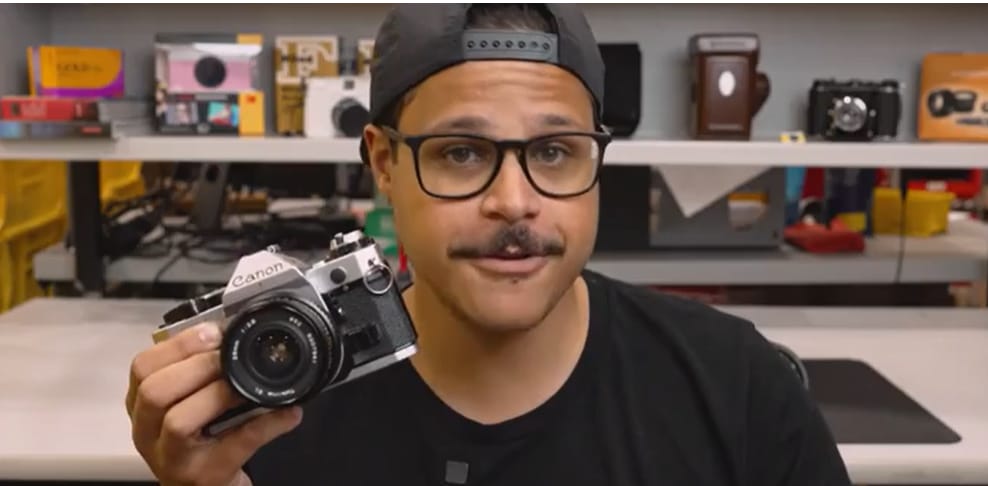 Camera Academy - Person with camera in his hand